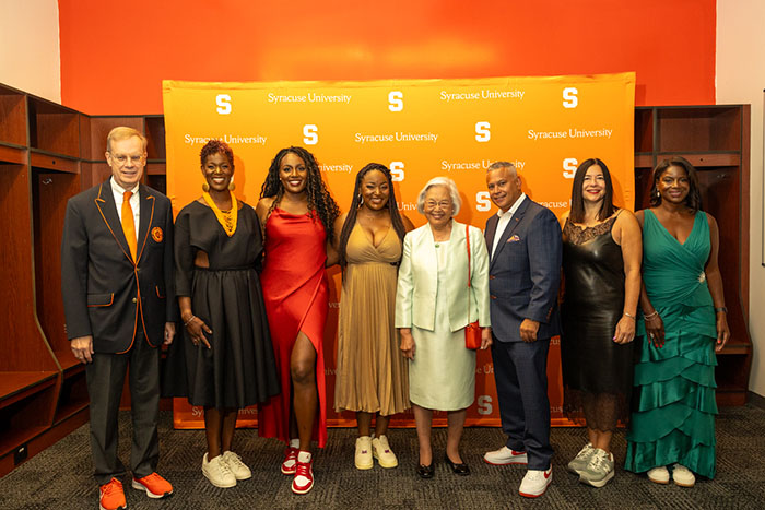 From left to right Chancellor Kent Syverud, Tara Favors, Sade Muhammad ’12 (Young alumni award), JaNeika James G’05, Dr. Ruth Chen, Jason Olivo displayed in a new window